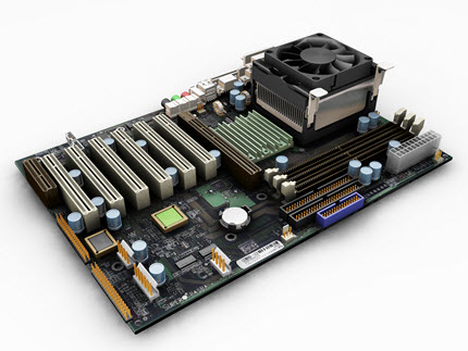 the CPU chip is located on the motherboard, beneath a cooling fan